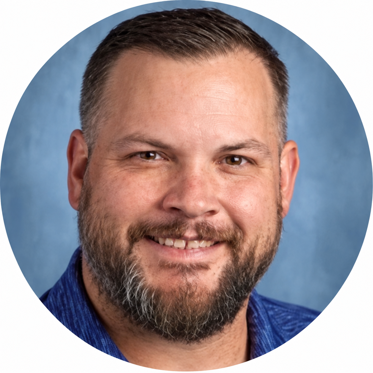 Jason Klingerman smiling in his school portrait