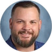 Jason Klingerman smiling in his school portrait
